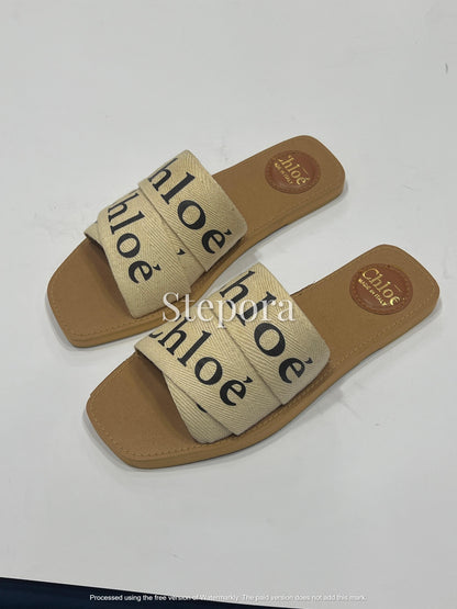 Cross-Strap Canvas Flat Slides – Bold Typography Summer Sandals in Black and Cream